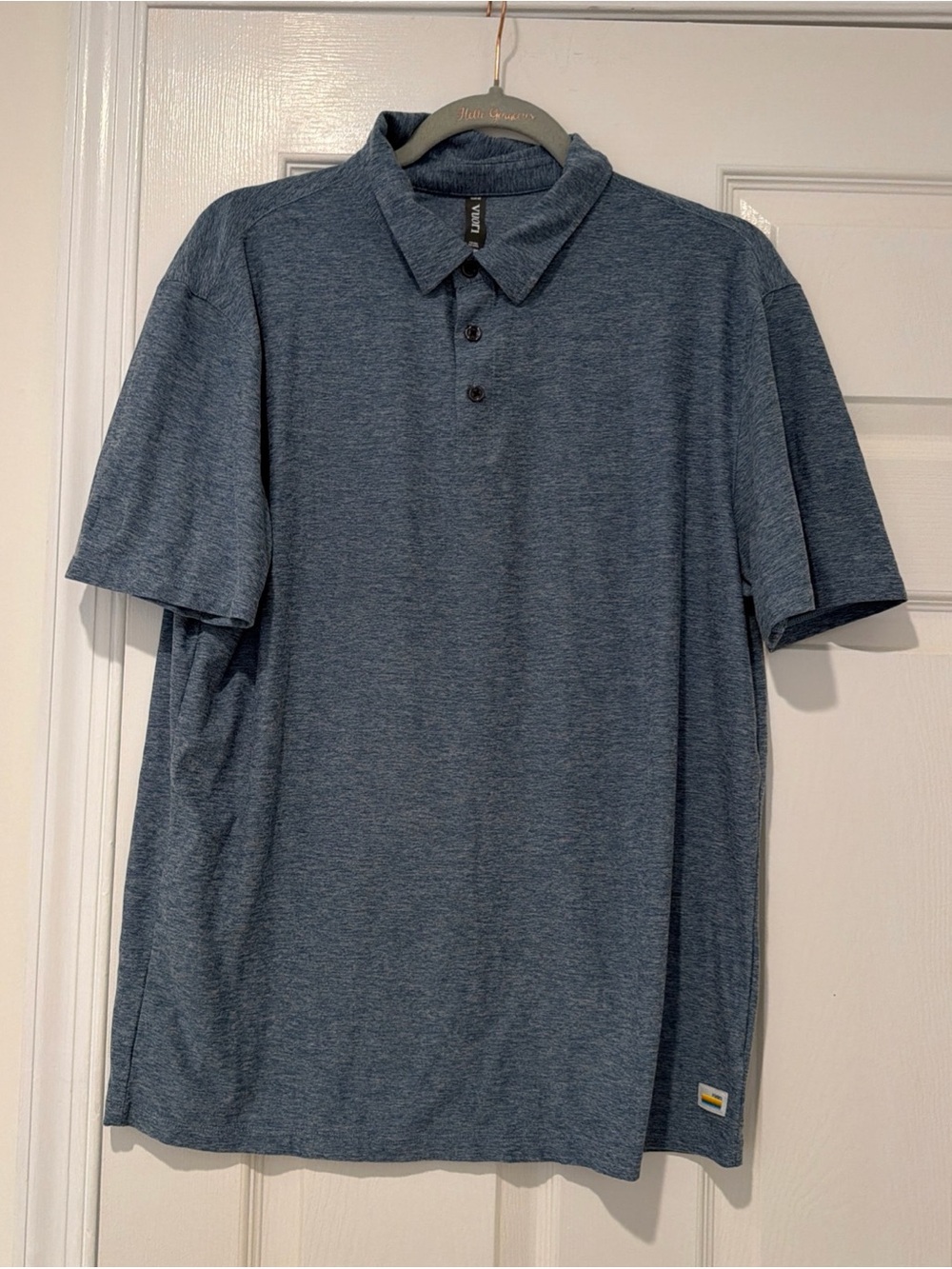 Vuori Heathered Navy Short Sleeve Polo